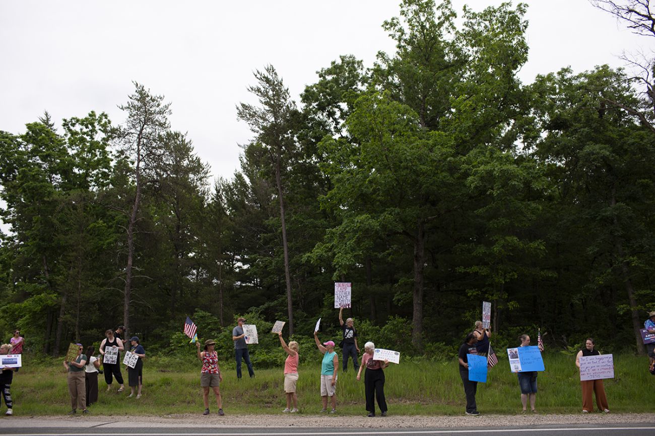 A wide-angle of demonstrators of an ICE facility.