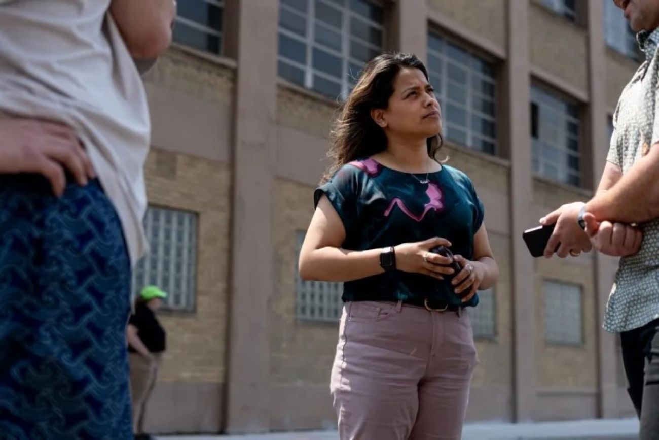Woman is interviewed