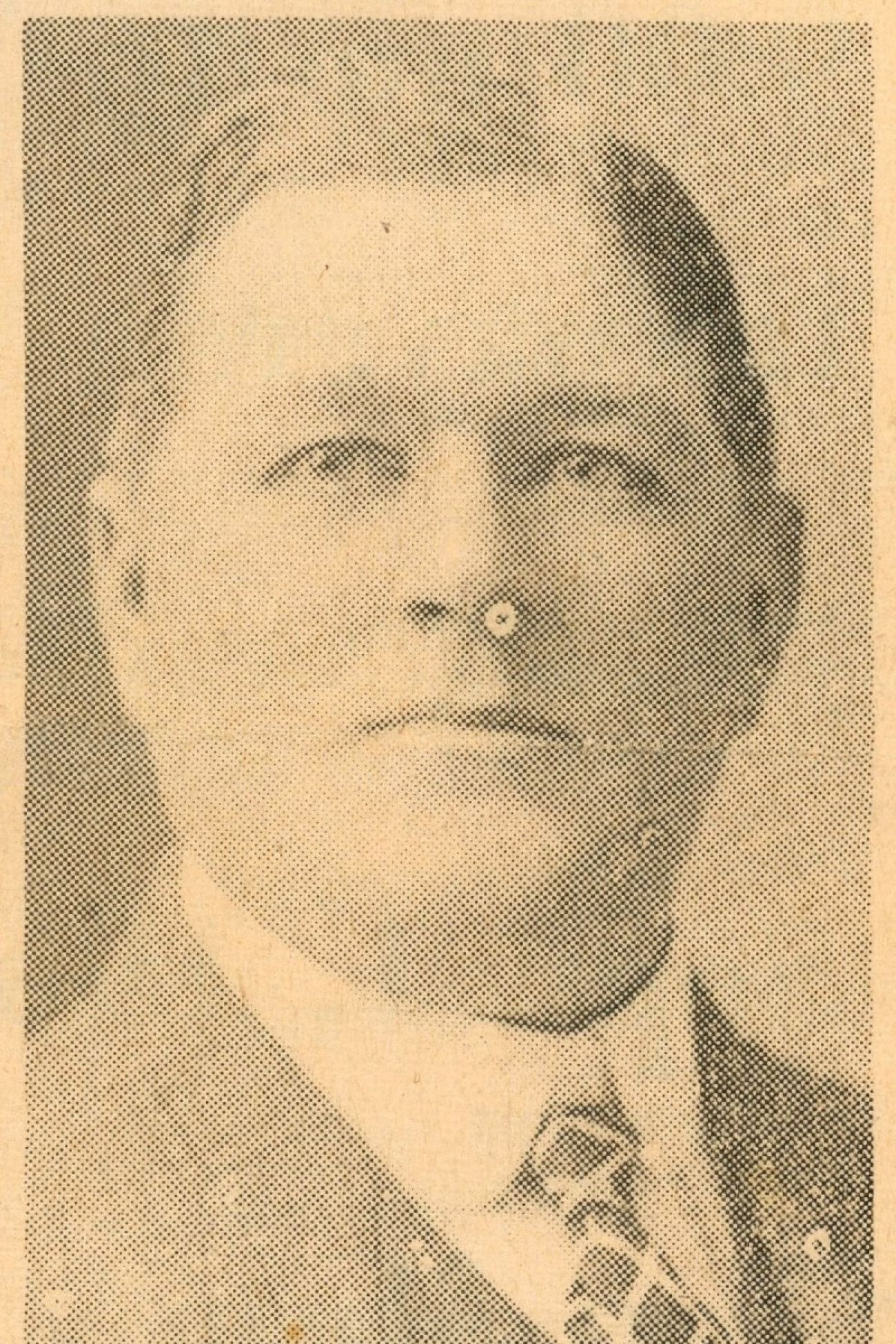 A sepia tone photo of Harry Stewart