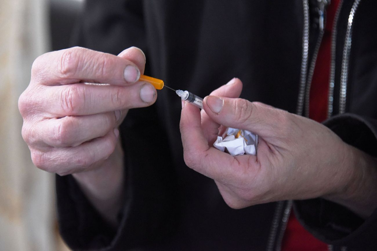 Someone holding needles. 