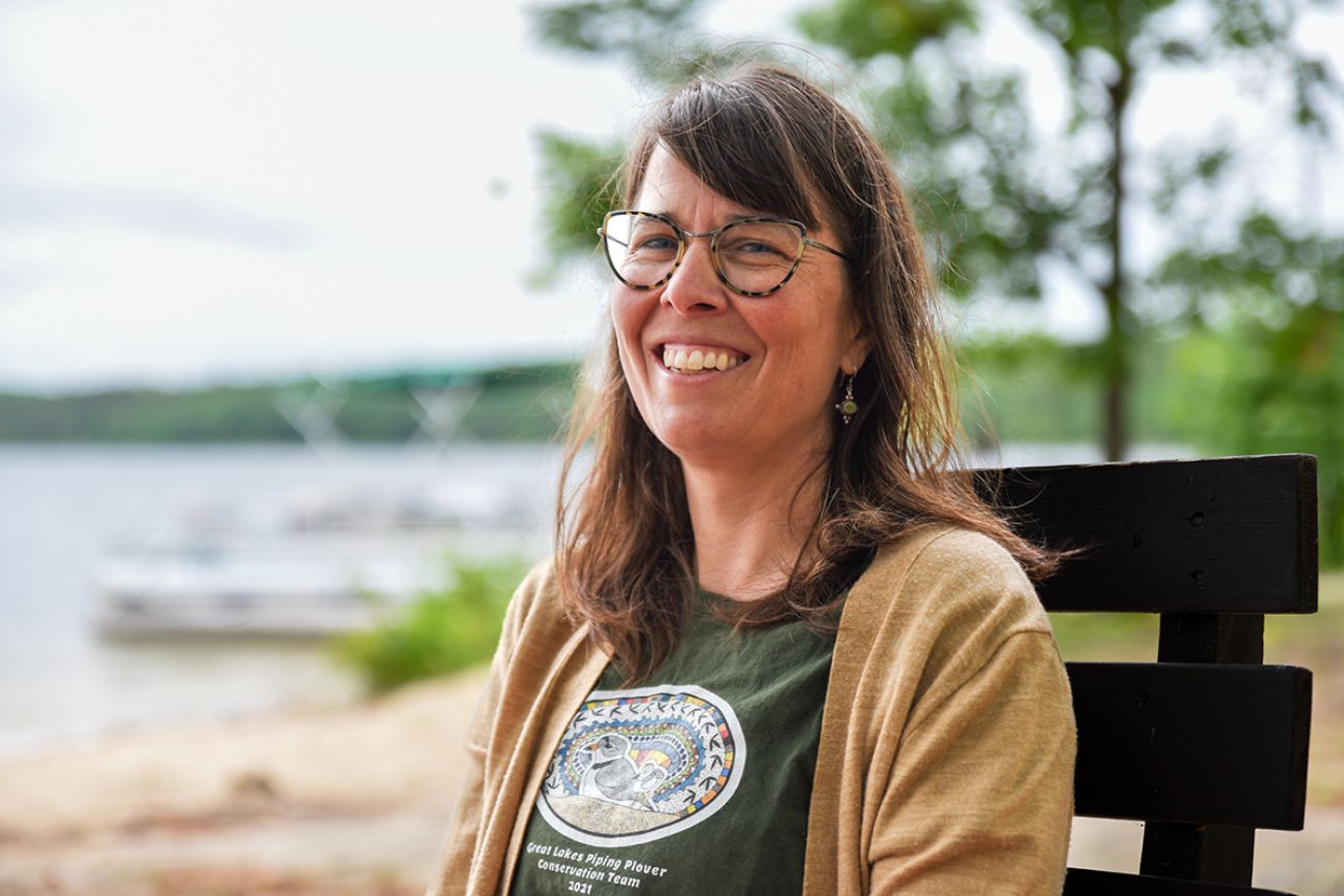Stephanie Schubel sits on a bench.