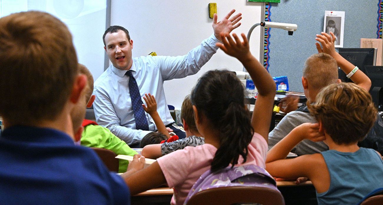 Teacher in front of the class.