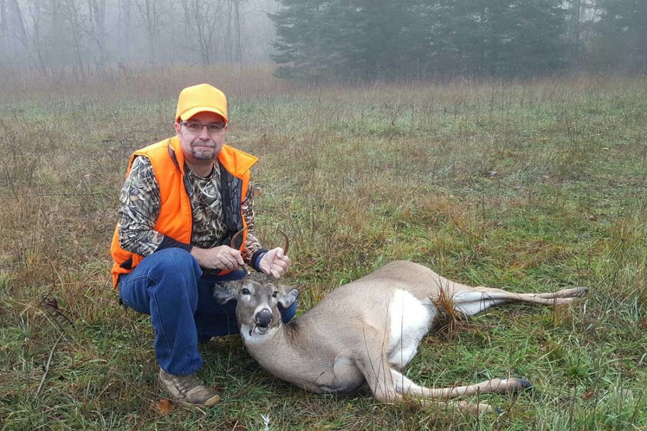J.D. Hock poses with a 4-point buck
