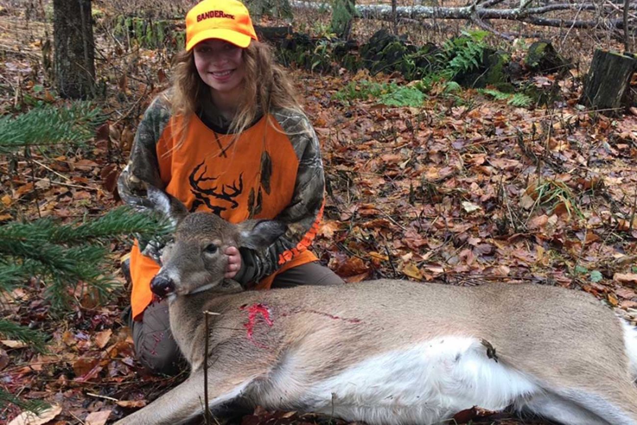 Hunter with doe