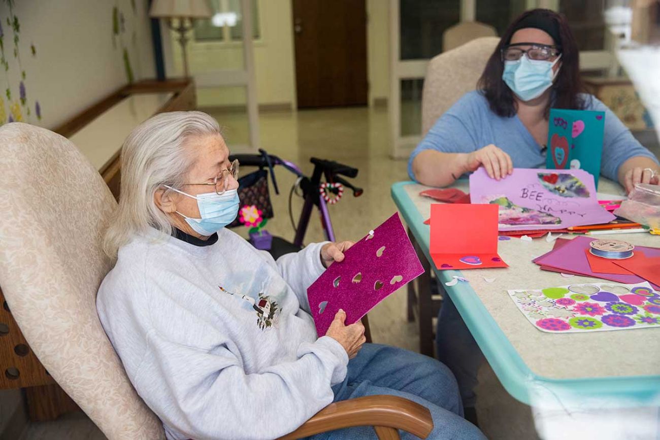 Marna Hunsburger making valentines