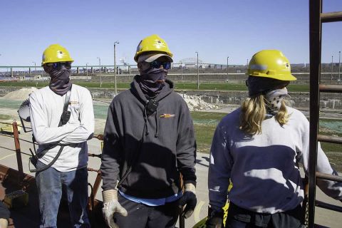 Freighter Lee Tregurtha crew members Scott Matis, 42, Isaac Drost, 24 and Gregory Myers, 26, awaiting public health workers for COVID vaccinations