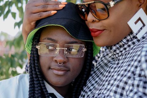 In the national spotlight as a performer with the Detroit Youth Choir, 17-year-old Symone has battled depression for years. She stands here with her mother, Que Jewelz, at their Highland Park home