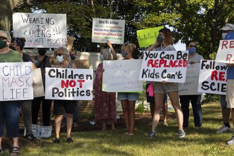 Parents rallied outside the Macomb County Health Department