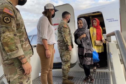 GRAIN scholars Lina Mohammadi, left, and Latifa Salangi, right, step off a plane 