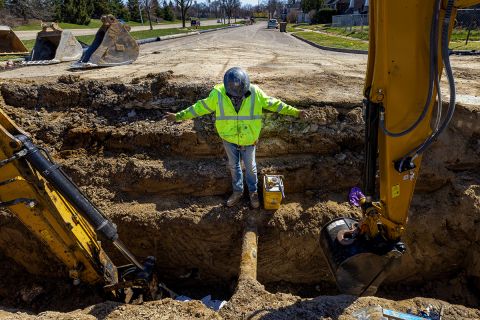 man in water main