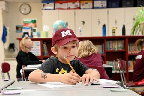 boy at desk