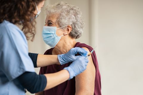 woman getting vaccine