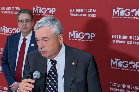 Ron Weiser in foreground and Matthew DePerno