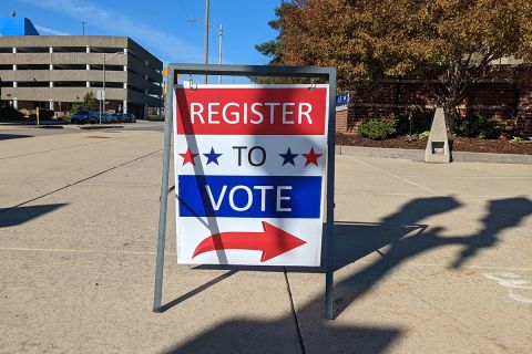 Register to vote sign