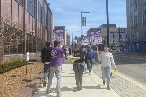 graduate students marching