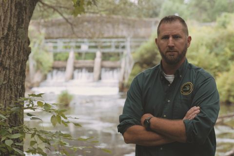 Matt Diana in front of Swan Creek Dam in Michigan