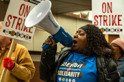 Yolanda Mcglone speaking into a megaphone