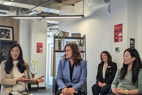 Gov. Gretchen Whitmer listening to people at a roundtable