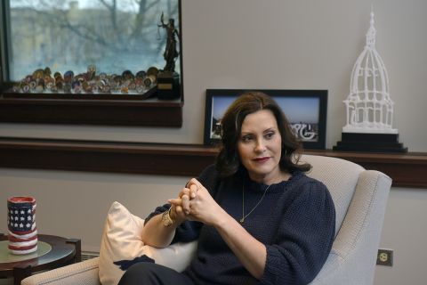 Gov. Gretchen Whitmer sitting in a chair