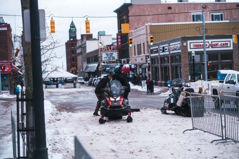 snowmobile on a snow-covered street