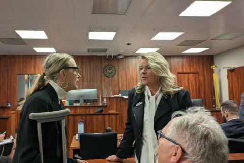 two women, Meshawn Maddock and Michele Lundgren, in a court room