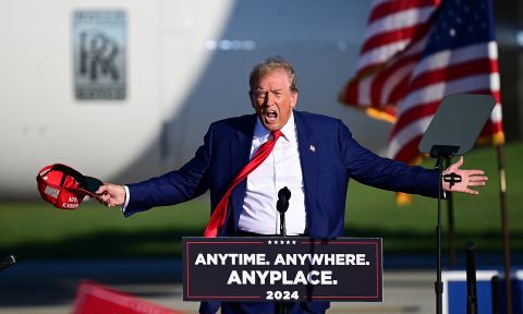 Trump speaks on stage in Freeland, Michigan