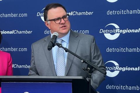 Matt Hall speaking into a microphone.
