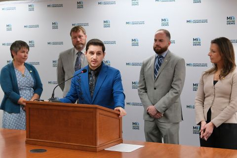 Lawmakers speak at a press conference in Lansing, Michigan.