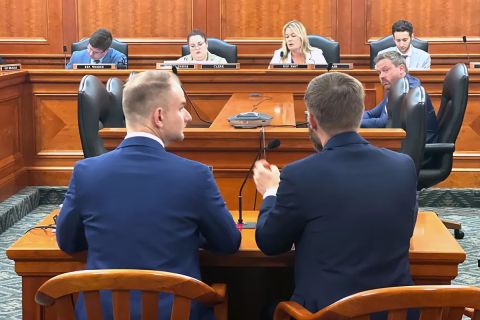 Jason Snead and Trent England at a table. 