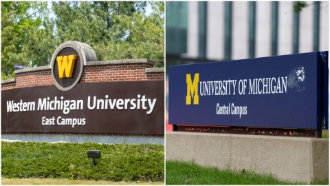 Signs for the Western Michigan University and the University of Michigan.