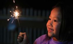 kid with sparkler