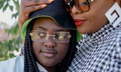 In the national spotlight as a performer with the Detroit Youth Choir, 17-year-old Symone has battled depression for years. She stands here with her mother, Que Jewelz, at their Highland Park home