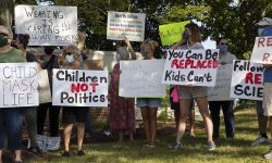 Parents rallied outside the Macomb County Health Department