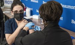 person getting vaccine