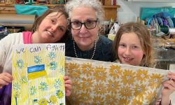 Joann Condino with kids holding towel