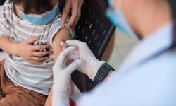 child receiving vaccine