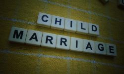 Child Marriage, word cube with background.