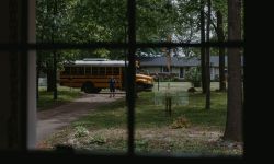 kid walking out of school bus