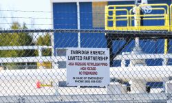 enbridge sign on fence