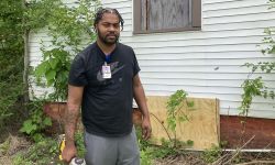 Byron Cooper standing outside