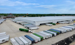 Trucks lined up outside building