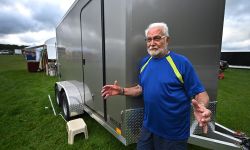 Robert Williams standing in front of a trailer