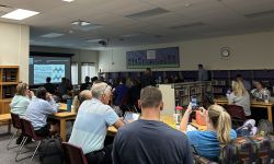 teachers sitting at tables 