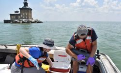 Two researchers on a boat