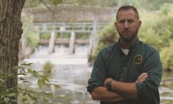 Matt Diana in front of Swan Creek Dam in Michigan