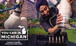 "You can in Michigan" ad. You can see a man work on a robot