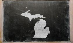 Michigan outline on a chalkboard