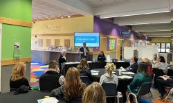 North Carolina Attorney General Josh Stein talks to a group of people