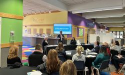 North Carolina Attorney General Josh Stein talks to a group of people