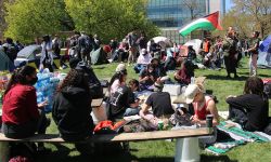 A group of Michigan State University students and community members outside